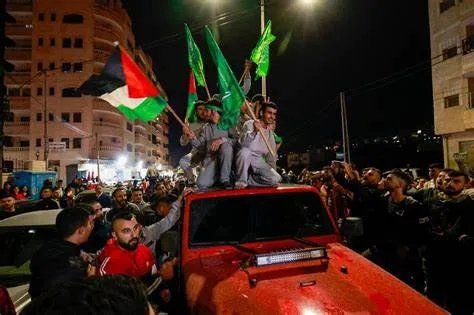 Gaza truce between Palestinian celebrations and Israeli protests 2 O46653IP - C J Global Newspaper