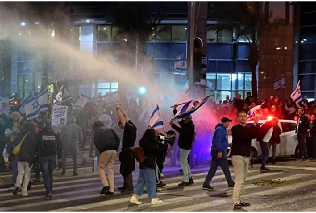 Gaza truce between Palestinian celebrations and Israeli protests 6 OI656P - C J Global Newspaper
