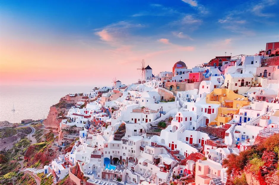 Let's explore the breathtaking beauty of Santorini, Greece. 2 image 80 png - C J Global Newspaper